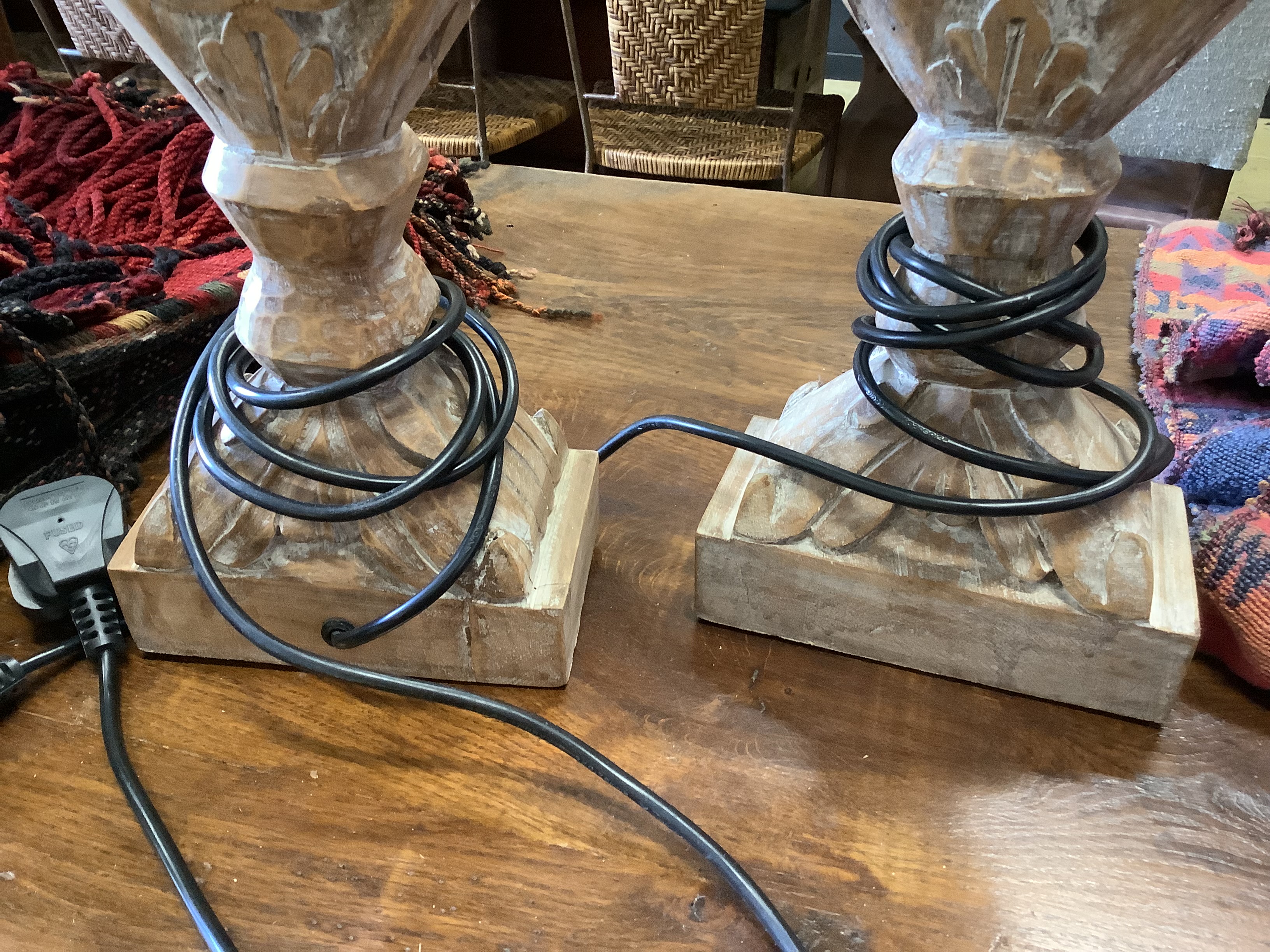 A pair of Italian style carved wood table lamps, height 46cm